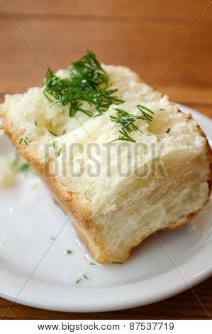 Traditional bread pampushki with parsley and garlic