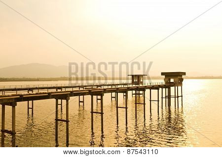 Top View Of A Dam At Sunset, Chiewlarn Dam Or Ratchaprapa Dam, Surat Thani, Thailand