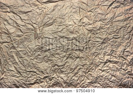 Close-up Of Rough Brown Wrinkled Packaging Paper Texture Background