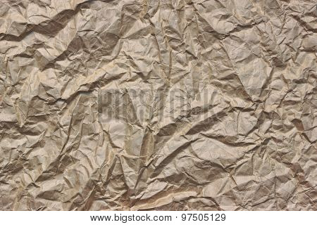 Close-up Of Rough Brown Wrinkled Packaging Paper Texture Background