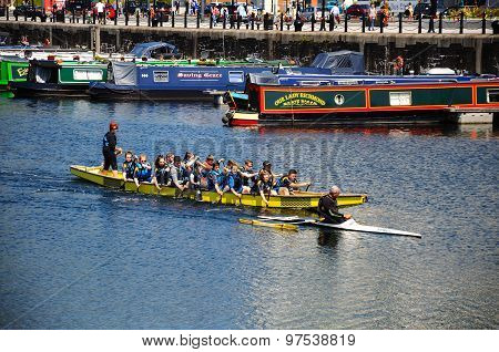 Children rowing in Salthouse Dock.
