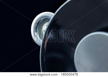 Abstract in Black Space
Macro photograph of part of a 1940's sewing machine. Black, industrial look. Photograph is suitable as a background layer in multiple business and industrial applications, advertising or as a wall decoration in business offices or 