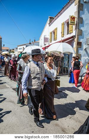 Saintes-maries-de-la-Mer, France - May 25, 2015. Religious feast in honor of the Holy Maries in Provence. Residents of the city in beautiful ancient dresses. The concept of ethnographic tourism