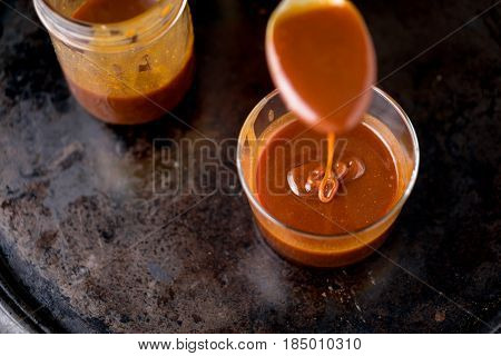 This sweet and delicious caramel sauce can be used as topping to add flavor to cakes ice cream and many other desserts.