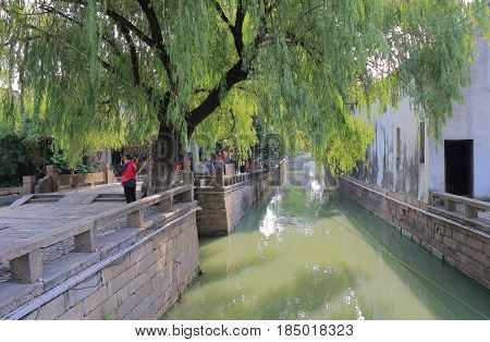 SUZHOU CHINA - NOVEMBER 3, 2016: Unidentified people visit Pingjiang historical street. Pingjiang historical street was a major thoroughfare of eastern Suzhou in Southern Song Dynasty.