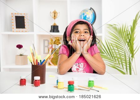 indian girl drawing, indian girl painting,asian girl colouring or drawing with sketch pen, indian girl and art and craft