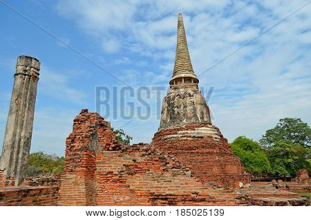 Buddhist pagoda in the shade of trees reveals itself for the pilgrim and tourist, Buddhism philosophy and religion, and tourists take photographs and initiate to secret knowledge