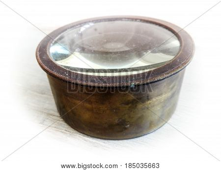 Picture of a very old camera lens magnifier.