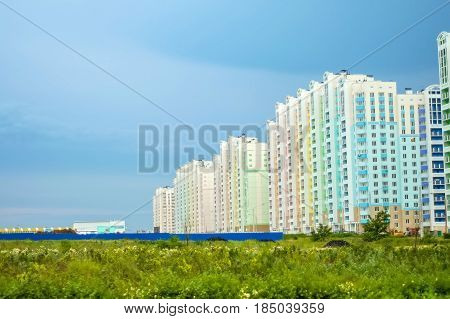 New modern colorful luxury apartmen buildings against blue sky