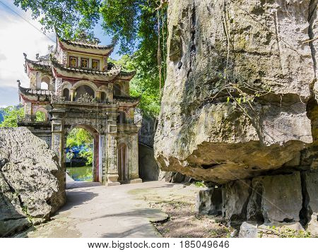 Main entrance gate to ancient Bich Dong pagoda complex, Ninh Binh province, Vietnam