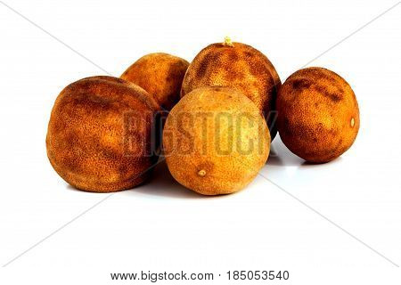iranian dried limes isolated on white background persian cooking ingredients.