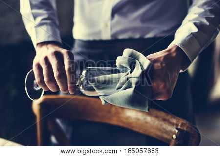 Restaurant Staff Wiping Glass on Table Setting Service for Reception
