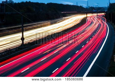 Highway at night with blurred car lights in a long exposure shot