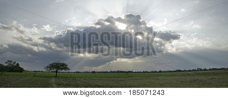 Afternoon at a countryscape farm with  magnificient clouds.