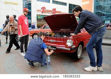 Orel Russia - April 29 2017: Retro car festival. ZAZ 968 and number change on the street