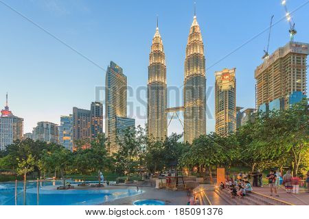 KUALA LUMPUR, MALAYSIA - AUGUST 13: Petronas Twin Towers at night on August 13, 2016 in Kuala Lumpur. Petronas Twin Towers were the tallest buildings (452 m) in the world from 1998 to 2004.