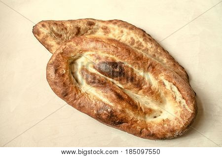 Freshly baked traditional bread flat cakes Armenian Matnakash and Georgian bread Shoti