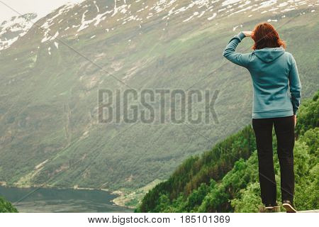 Woman Tourist In Norwegian Mountains Fjords