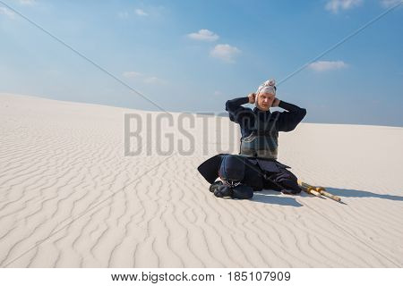 Man In Traditional Japanese Clothes, Concentratedly Dresses Armor, Bogu