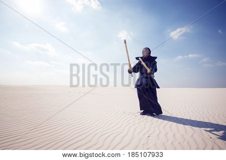 Warrior In Traditional Armor For Kendo Ready For A Fight