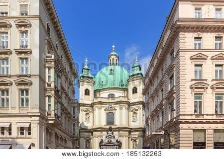 VIENNA AUSTRIA - APRIL 11 2016: Peterskirche (Saint Peter Church) is a Baroque Roman Catholic Parish Church in Petersplatz on Graben Street of Vienna City Austria