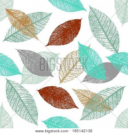 A seamless background pattern of vector skeleton leaves in teal blue and rusty brown, autumnal repeat print