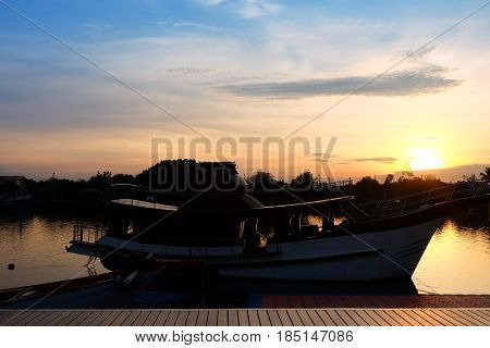 boat at sunset at bangtaboon,Phetchaburi Province, thailand