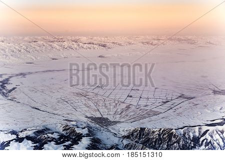 View From The Aircraft To The Mountains In Tashkent, China And Kirgistan, Covered With Snow