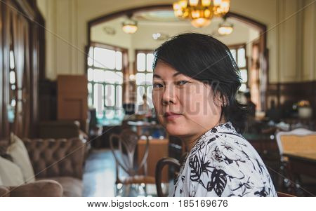 Asian Women Smile In Coffee Shop Vintage Style