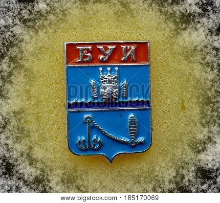 USSR - circa 1977: a badge with the coat of arms of the city of Buoy, Kostroma region from the series 