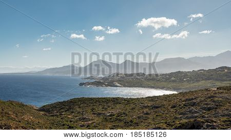 View Of Calvi Citadel And Mountains From Revellata In Corsica