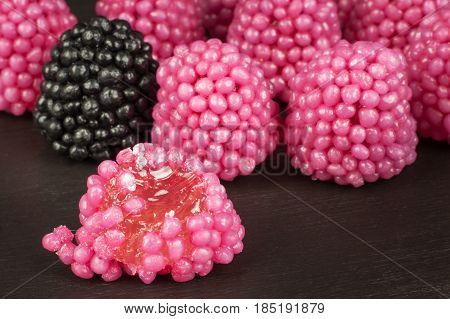 Jelly candies on a background. Pile of multiple different candies. Risk of obesity and tooth decay