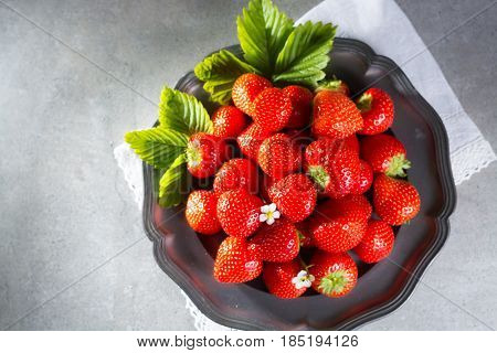 Fresh ripe strawberry. Red strawberry and blossom. Strawberry Juice. Loosely laid strawberries in different positions.