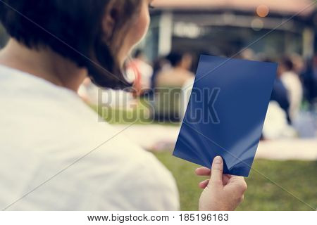 People relaxing listening music in the park