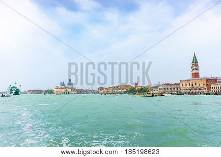 Venice Italy - April 27 2017: Beautiful canal church and Venice residential style beside Grand Canal in Venice Italy.