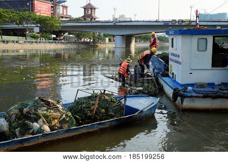 Sanitation Worker Picking Up Trash