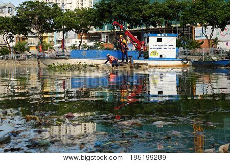 Sanitation Worker Picking Up Trash