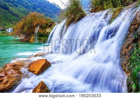 Jiulong Waterfall In Luoping, China.