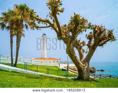 Spain lighthouse with trees in Torrox, Malaga