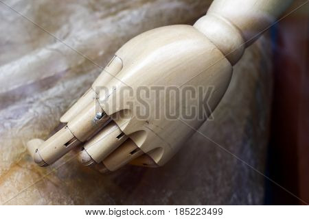 Close Up Of A Hand Of A Big Wooden Man Model For Painting. Fingers