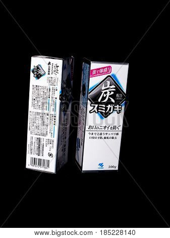 GOMEL, BELARUS - MARCH 5, 2017:Japanese toothpaste Kobayashi with charcoal.Kobayashi Pharmaceutical Co., Ltd. manufactures and sells OTC pharmaceuticals, oral hygiene products.