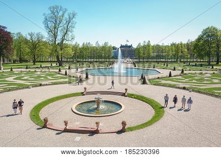 Apeldoorn, The Netherlands, May 8, 2016: Dutch baroque garden of The Loo Palace a former royal palace and now a national museum located in the outskirts of Apeldoorn in the Netherlands