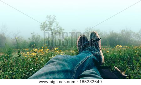 Feet selfie traveler relaxing on ckiff mountains outdoor with. Travel lifestyle