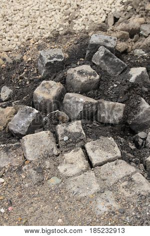 Old cobble stone - background/ Old cobble stone in heap with grit.