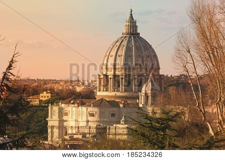 Basilica of Saint Peter, Rome. Italy. Fabulous photograph of the dome of St. Peter's Basilica in Rome in Italy. Photo taken from the Gianicolo Terrace. Antiqued colors. Sunset lights.