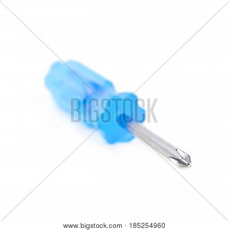 Tiny crosshead screwdriver with a plastic blue handle, isolated over the white background