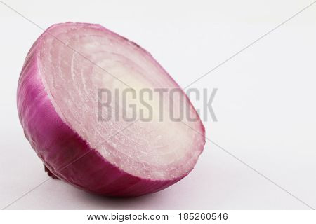 Red bulb onion (Allium cepa) isolated in white background