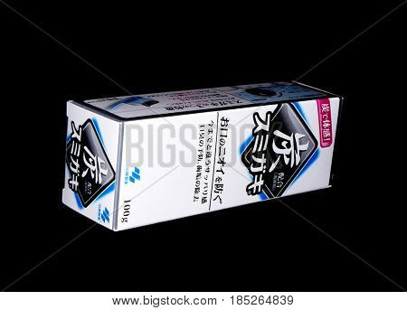 GOMEL, BELARUS - MARCH 5, 2017:Japanese toothpaste Kobayashi with charcoal.Kobayashi Pharmaceutical Co., Ltd. manufactures and sells OTC pharmaceuticals, oral hygiene products.