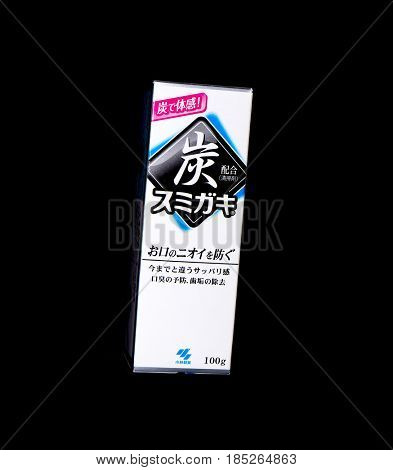 GOMEL, BELARUS - MARCH 5, 2017:Japanese toothpaste Kobayashi with charcoal.Kobayashi Pharmaceutical Co., Ltd. manufactures and sells OTC pharmaceuticals, oral hygiene products.
