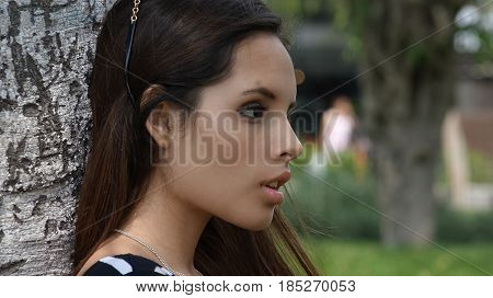 A Serious and Unemotional Hispanic Teen Girl